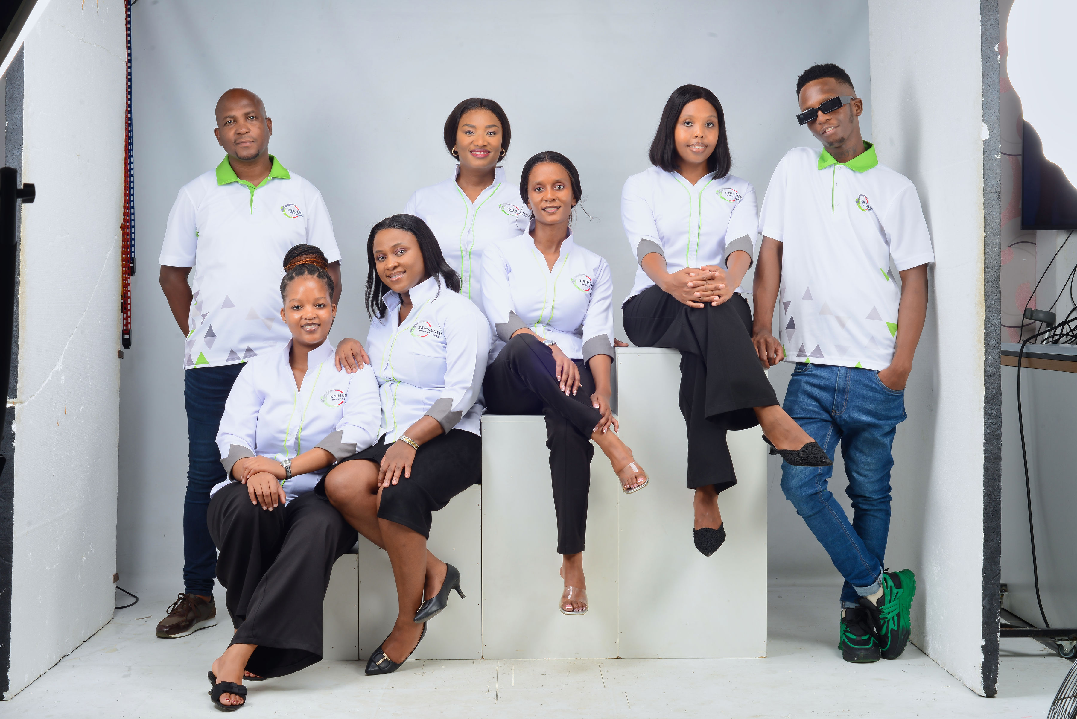 Esihlentu Group team assembled for a studio photograph