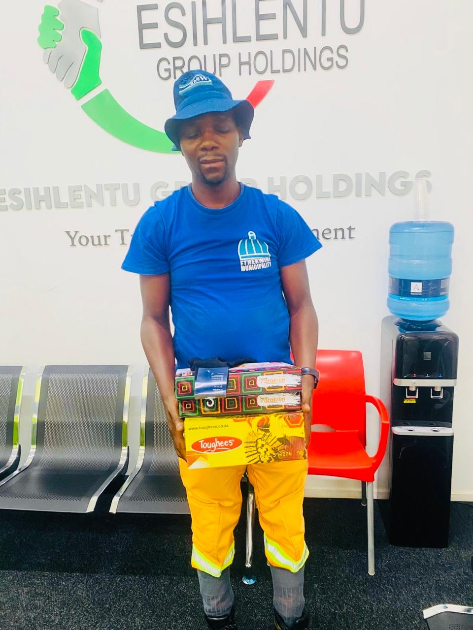Community member receiving school shoes
